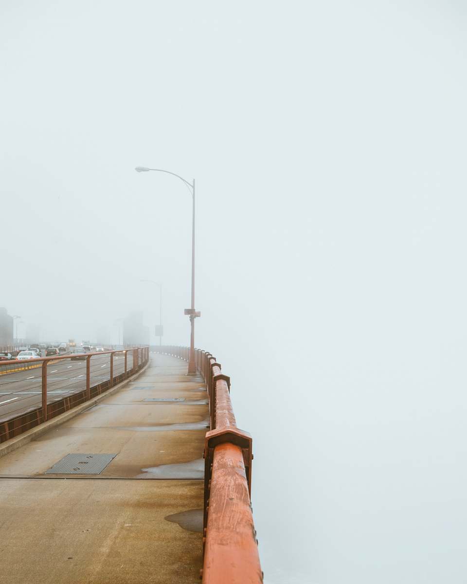 minimal brown road light during daytime mist